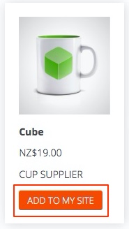 A white mug with a green cube on it<br><br>Description automatically generated